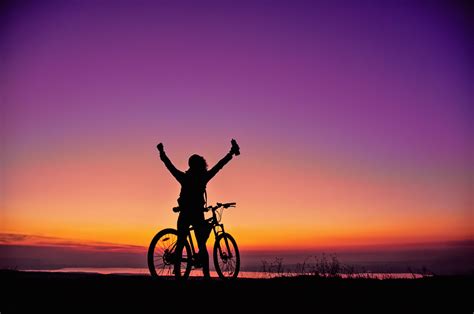 Girl With A Bicycle Watching The Sunset Global Sportainment