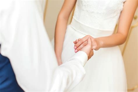 Premium Photo Wedding Couple Holding Hands Bride And Groom