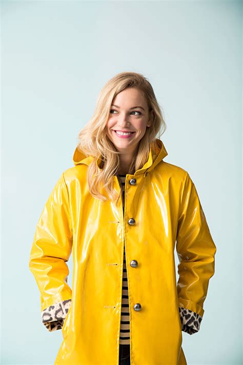 5 Stylish Raincoats Thatll Keep You Dry All Spring Long Yellow Raincoat Yellow Rain Jacket