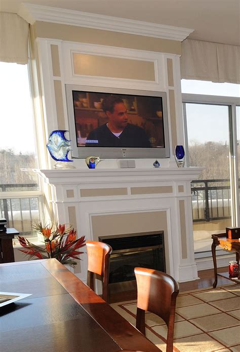 When To Mount A Tv Over A Fireplace White Paneling Above Fireplace