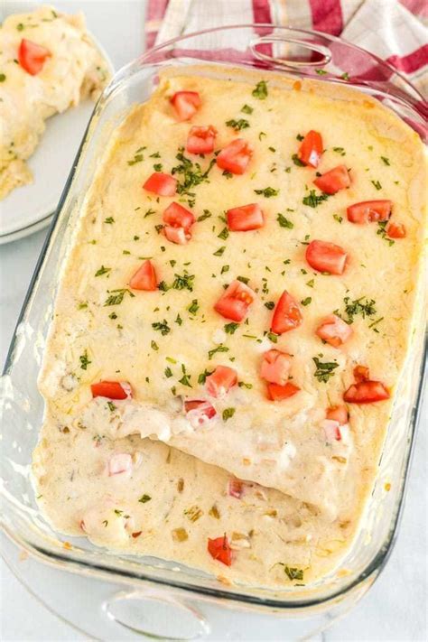 A Pan Full Of Creamy Chicken Enchiladas Food Cooking Chicken To