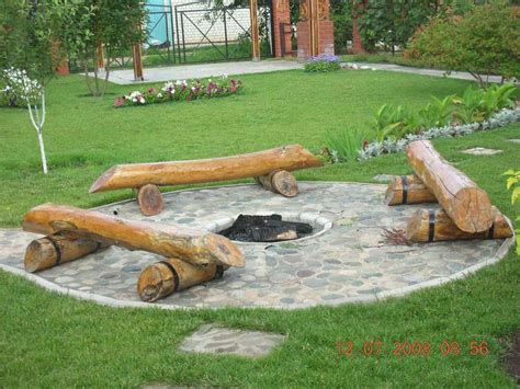 Log Benches Surrounding A Pit In Stone Awesome Firepit Area Ideas For