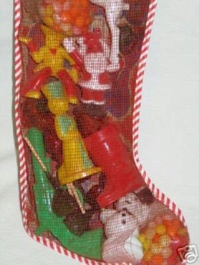 You get a gummy candy, now or later, caramel apple pop, lemon heads, razzles, air head, tootsie roll, fun dip, tootsie roll, fruit. 1950's Mesh Stocking Filled with ROSEN TOYS & CANDY ...