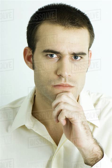 Man With Hand Under Chin Portrait Stock Photo Dissolve