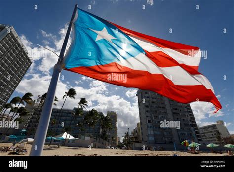 A Puerto Rican Flag Flying On The Beach In Condado San Juan Puerto