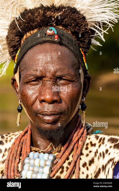 Man From The Toposa Tribe Posing In His Traditional Warrior Costume