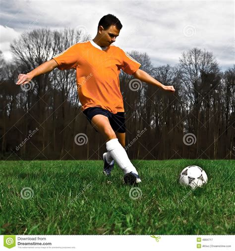 Soccer Player Kicking Royalty Free Stock Photography - Image: 4884717