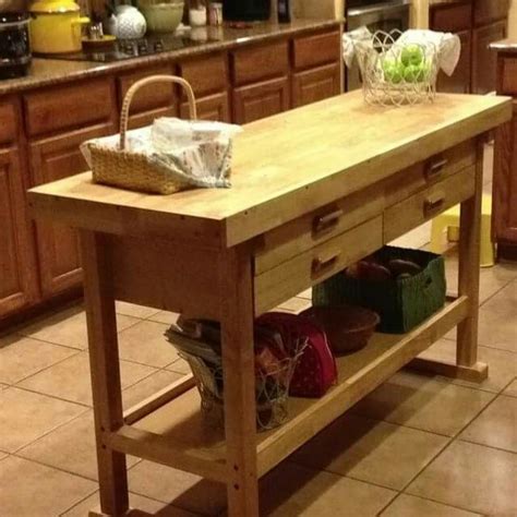 Work tables in many forms, for all functions. Harbor Freight Tools Wooden Work Bench. Kitchen island or ...