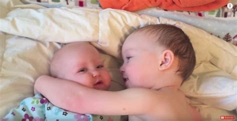 Cute Older Brother Comforts His Crying Baby Sister