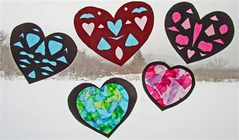 How to make beautiful paper decoration under 5 mins with copy paper and scissors by paper cutting videos. Paper Heart Window Decorations :: YummyMummyClub.ca