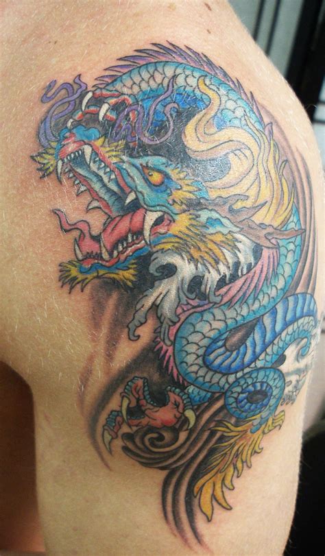 Asian Dragon Applied To Someones Shoulder At Triphammer Tattoo