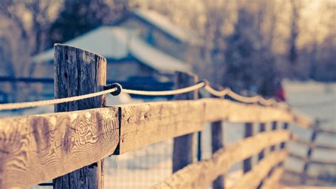 Selective Focus Photography Of Brown Wooden Railings Near House Fence