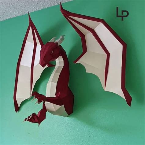 An Origami Dragon Is Hanging On The Wall