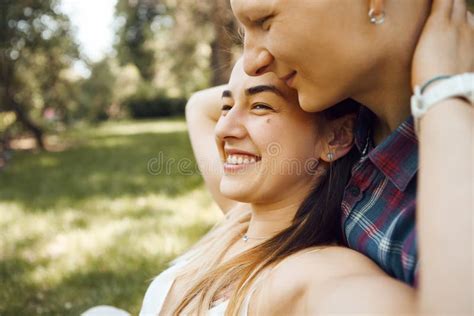 Close Up Image Of Young Couple Having Fun And Laughing In Park
