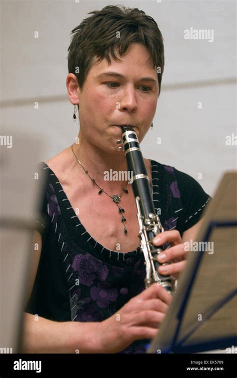 Woman Playing The Clarinet In A At A Charitable Music Concert To Support Aspiring Musicians And