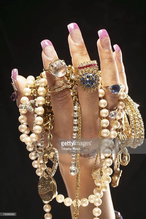Stock Photo Indian Womans Hand Holding Flashy Jewels Jewel Images