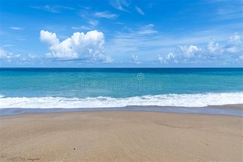 Beach And Sea Wave Reaching Coastal With Soft Light Tropical Paradise