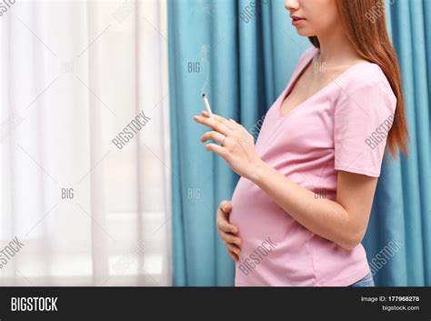 Pregnant Woman Smoking Cigarette Image And Photo Bigstock