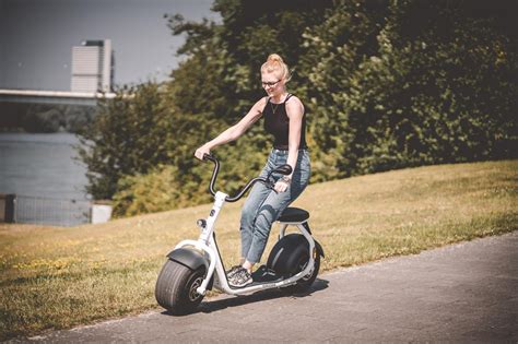 The Scrooser Is An Electric Kick Paddle Scooter Combined With A Moped