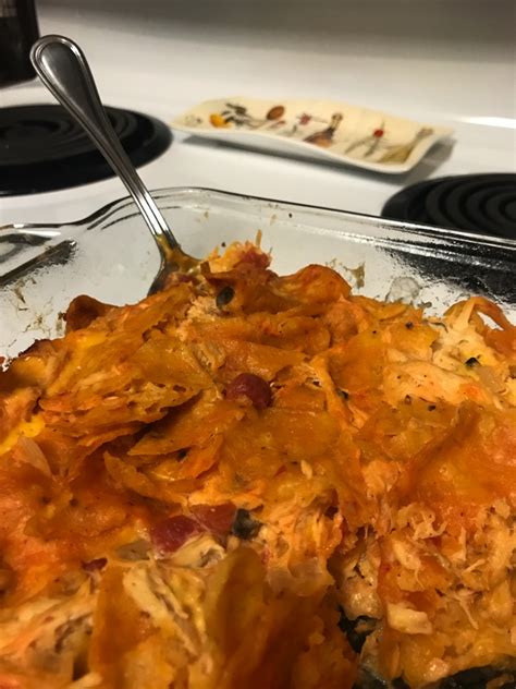 The cheese topping finishes the dish perfectly. Mexican Chicken (Dorito Casserole) - Lost My Cookbook
