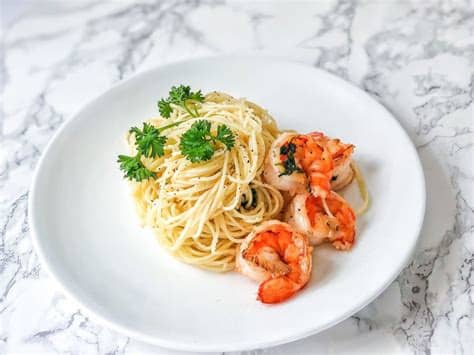 A nontraditional take on angel hair pasta, this creamy miso pasta with brussels sprouts from love & lemons will shake up your weeknight meal routine. Easy Shrimp With Angel Hair Pasta Recipe