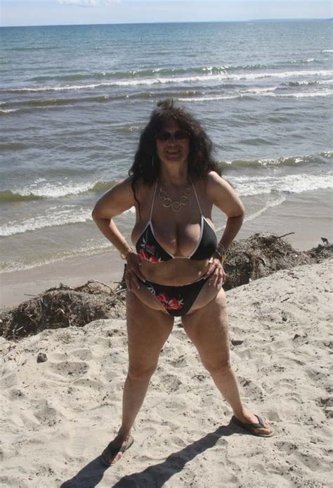 Hot Busty Beach Mature In String Beer Bikini