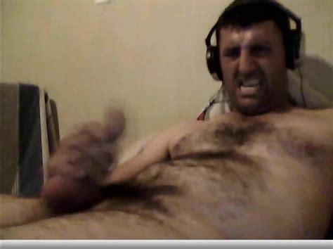 Evil Face Jerking Off His Cock And Cums On His Stomach It