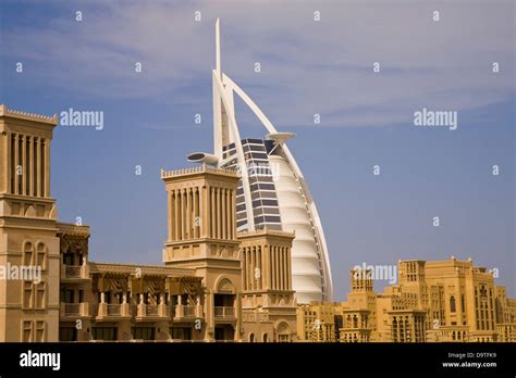 The Towering Sail Shaped Burj Al Arab Hotel Rises Above Its Sister