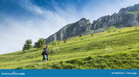Man Hiking In Green Mountains Stock Image Image Of Grass Outdoors