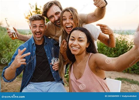 Multiracial Two Couples Taking Selfie While Leaning On Trailer Stock Image Image Of Couple