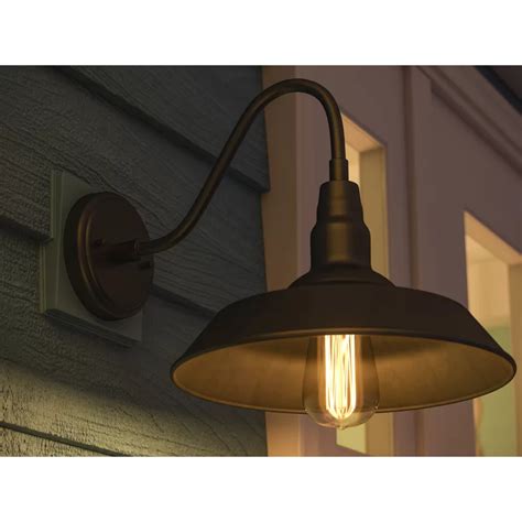 An Outdoor Light On The Side Of A House