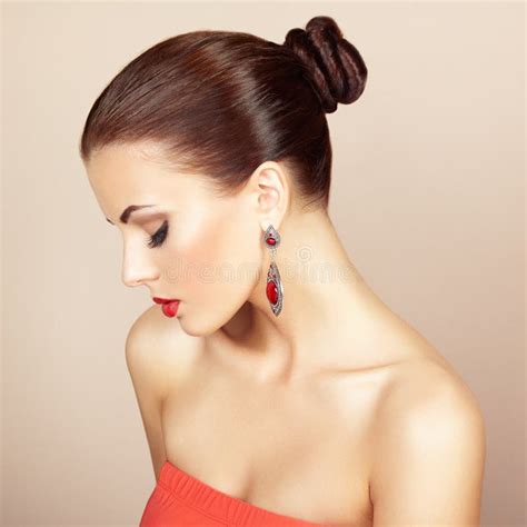 Portrait Of Beautiful Brunette Woman With Earring Perfect Makeup Stock