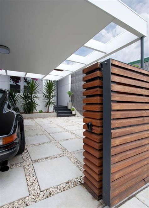 Browse modern garage pictures and designs. wooden gate and the modern carport for the moder house ...