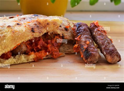 Traditional Bosnian And Balkans Food Meat In Bread Cevapi Stock Photo