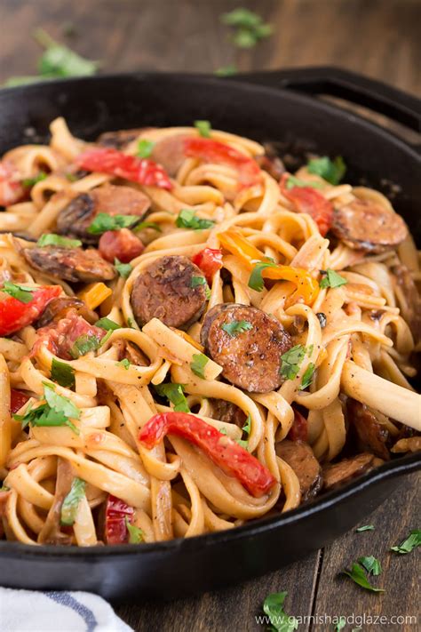 This easy smoked sausage with pasta recipe is topped off with the addition of vegetables for a filling family dinner. Creamy Cajun Pasta with Smoked Sausage - Garnish & Glaze