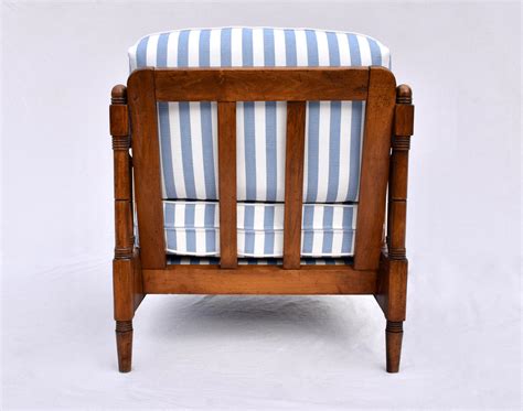 Broyhill Premier British Colonial Style Chair And Ottoman At 1stdibs