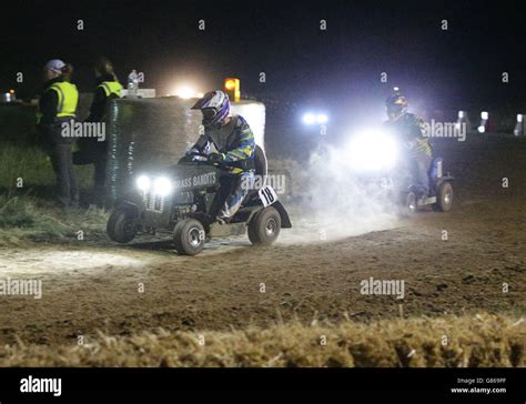Drivers On Their Lawnmowers Racing Into The Night During The Blmra 12