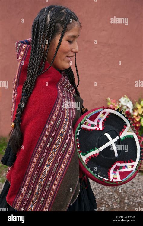 Peru A Young Woman In Traditional Indian Costume With Long Braided