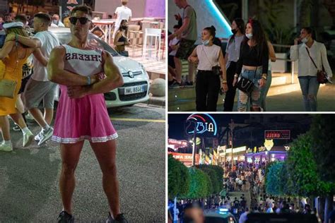 brits return to magaluf s strip under watchful eyes of cops after majorca added to green list