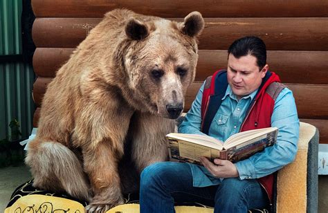 russian couple still resides together 23 years after adopting orphaned bear