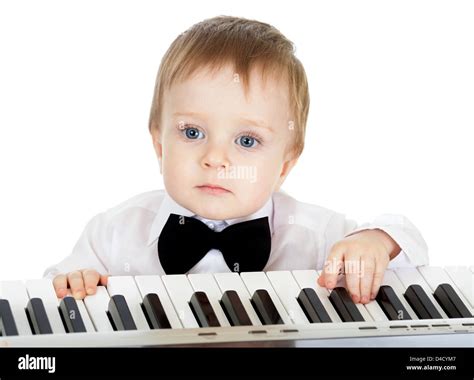 Adorable Child Playing Electronic Piano Stock Photo Alamy