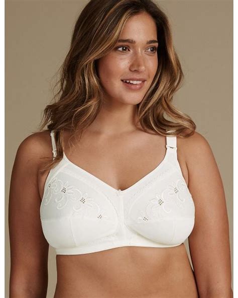 marks and spencer total support non wired embroidered crossover full cup bra b g in natural lyst