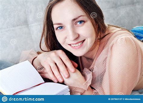 Cute Young Girl Reading Relaxed On The Sofa Stock Image Image Of Female Reading 207963137