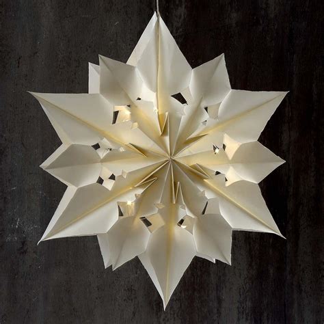 A Large And Shining Star Made From Paper Bags Diy Christmas Star Diy
