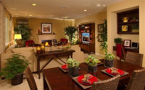 In an open floor plan, stake out an area for the living room with a small sectional, a large coffee table, and a rug.in this space, the seating placement distinguishes a cozy living space from the kitchen and dining area beyond. Dining Room, Living Room | Living room dining room combo ...
