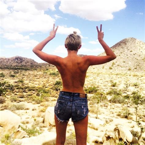 Miley Cyrus Goes Topless In The Desert E Online
