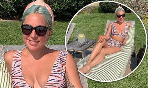Lady Gaga Shows Off Her Incredible Figure In A Plunging Pink Swimsuit As She Lounges By The Pool
