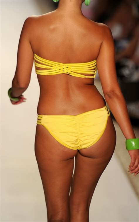 Lights Camera Flashdance Adrienne Bailon Shows Off Her Bikini Figure At Miami Fashion Week