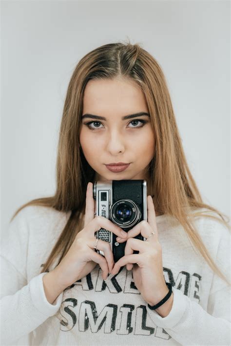 Girl Holding Camera In Hand Stock Photo People Stock Photo Free Download