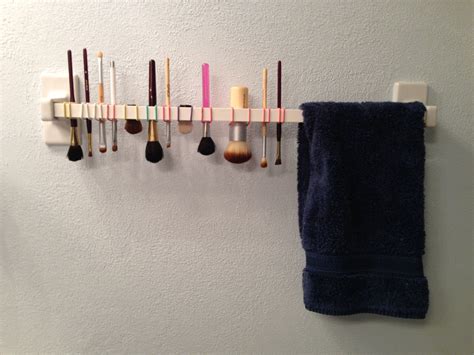 You don't have to worry about tugging or the trimmer getting stuck. Use a hair tie to hang makeup brushes upside down after ...